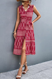 Deep Red geometric print sleeveless midi dress with tie waist and button front.