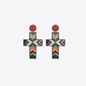 Geometric cross statement earrings with tribal pattern in beige, teal, and orange.