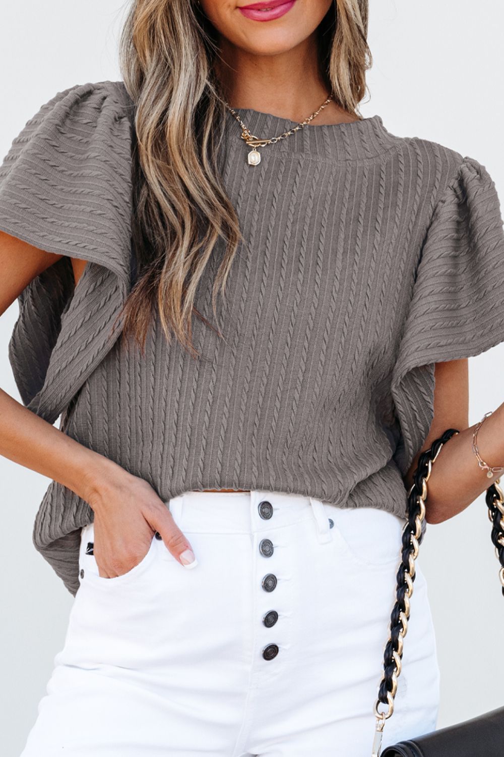 Gray cable knit flutter sleeve top with mock neck