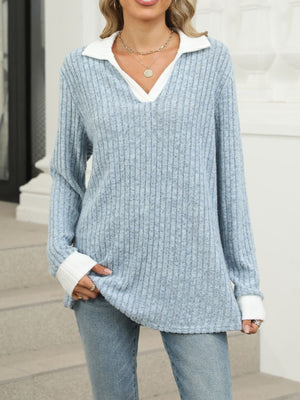 Light blue ribbed knit long sleeve t-shirt with white collar and cuffs.