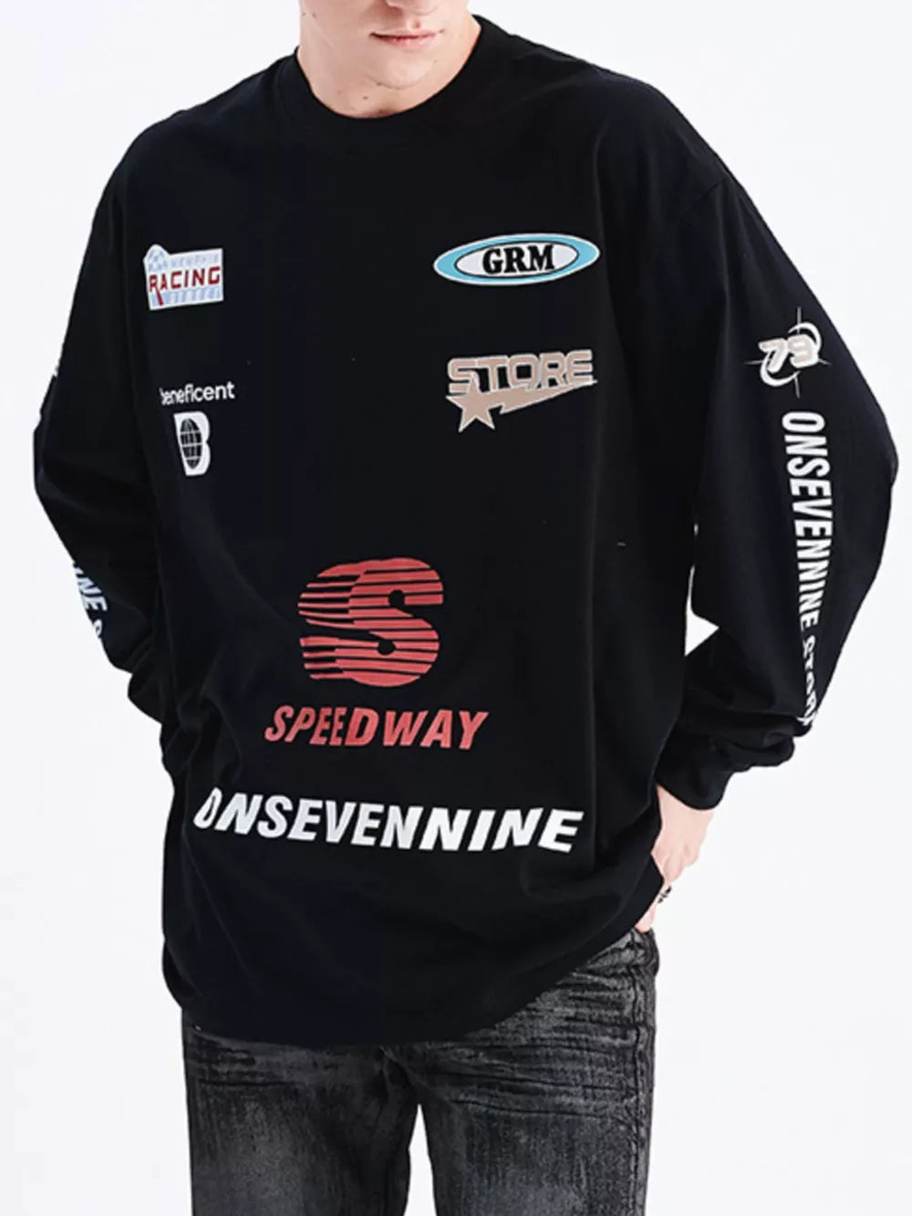 Black graphic oversized long sleeve t-shirt with racing and store logos.