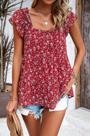 Crimson floral peplum blouse with flutter sleeves and square neckline.