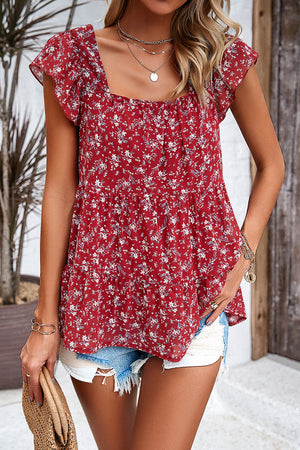 Crimson floral peplum blouse with flutter sleeves and square neckline.