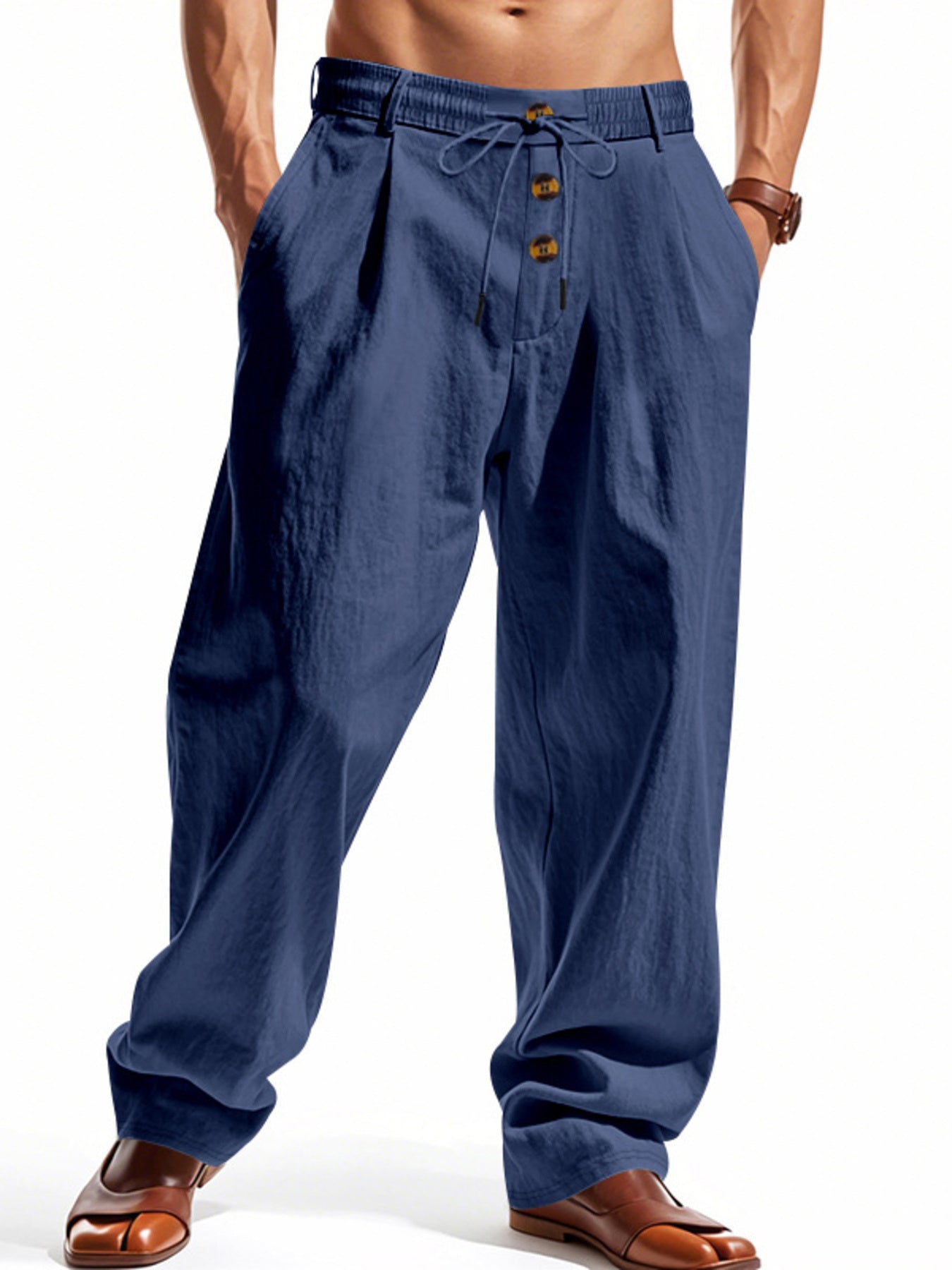 Men's navy blue drawstring loose fit pants with button detail and pleats.