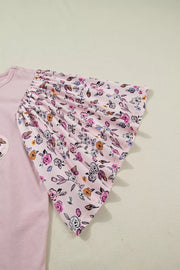 Maternity crew neck shirt in pink cotton with patchwork floral print flutter sleeves.
