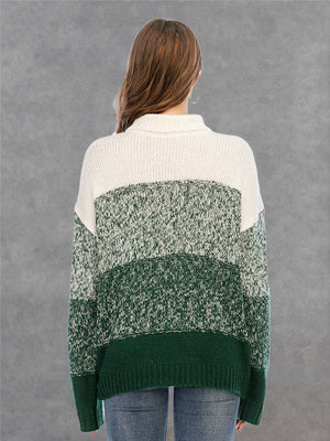 Colorblock turtleneck sweater in green and white acrylic with defined panels.
