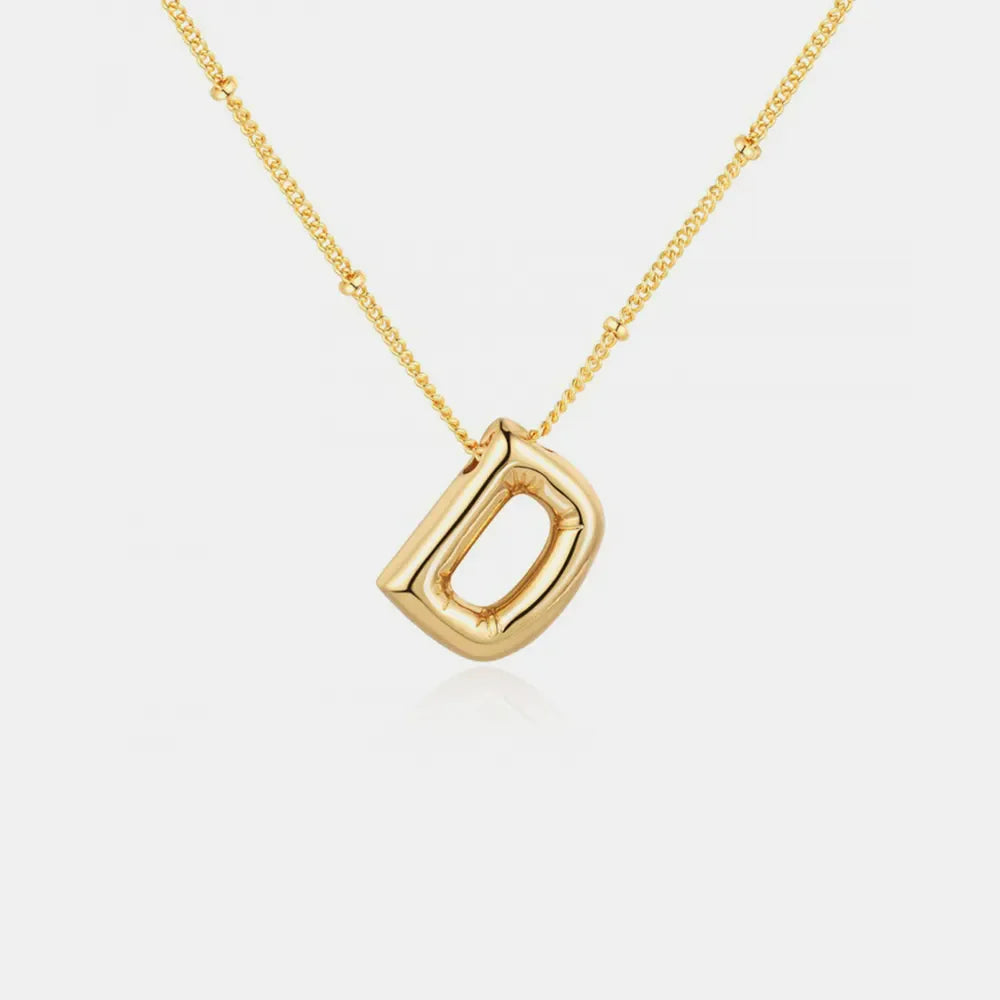 Gold initial D pendant necklace with beaded chain