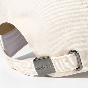 Off-white distressed cotton baseball cap with metal buckle detail