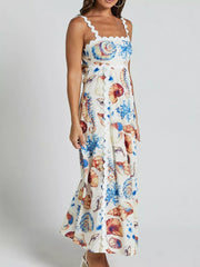 Seashell print midi dress with scalloped trim and button front.