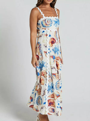 Seashell print midi dress with scalloped trim and button front.