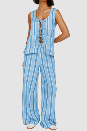 Light blue striped linen co-ord set with tie-front sleeveless top and wide-leg pants.