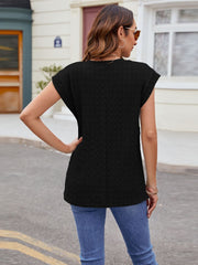 Black textured cap-sleeve tee with subtle knit, casual style.