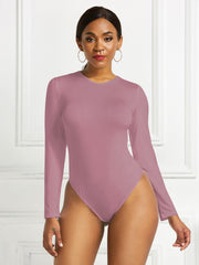 Sculpted ribbed jersey bodysuit in dusty pink with long sleeves and a crew neck.