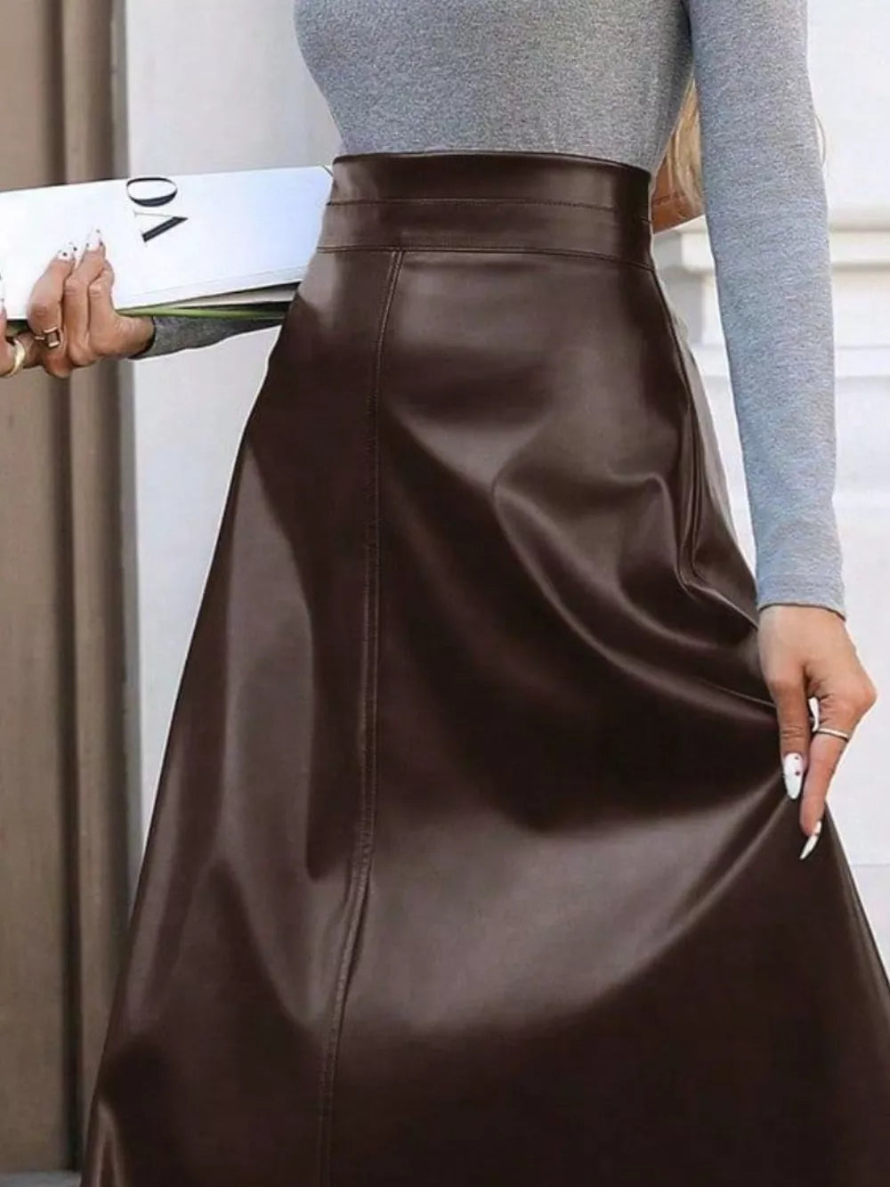 Brown leather-like A-line midi skirt with central seam detail