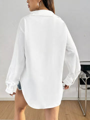 White long sleeve button-up maternity shirt with classic collar and curved hem.