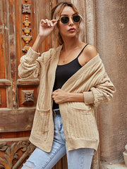 Tan textured open-front cardigan with pockets and ribbed cuffs.