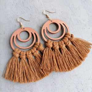Macrame tassel and wood circle earrings in caramel with knotted detail.