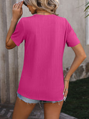 Hot Pink textured tee with button detail and split hem, short sleeves
