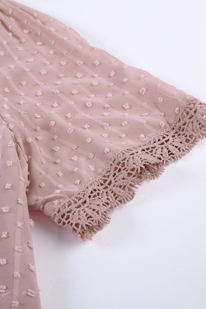 Dotted Swiss lace trim blouse in dusty pink with short sleeves and crochet detail.