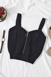 Black ribbed knit crop top with exposed zipper detail and wide straps.
