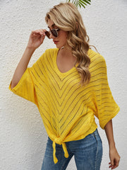 Yellow chevron knit tie-front cover-up with batwing sleeves.