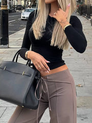Long Sleeve Fitted T-shirt in Black, front view