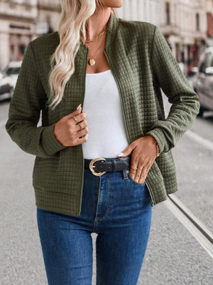 Quilted bomber jacket in Army Green with zip closure and ribbed collar.