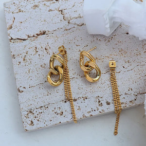 Gold linked chain drop earrings with delicate chain fringe detail