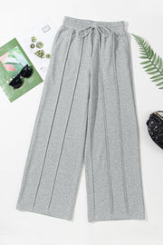Gray seamed wide leg lounge trousers with drawstring waist and elastic waistband.