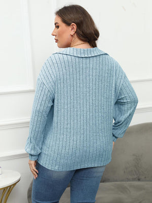 Relaxed ribbed polo top in Cloudy Blue with a collared neckline and long sleeves.