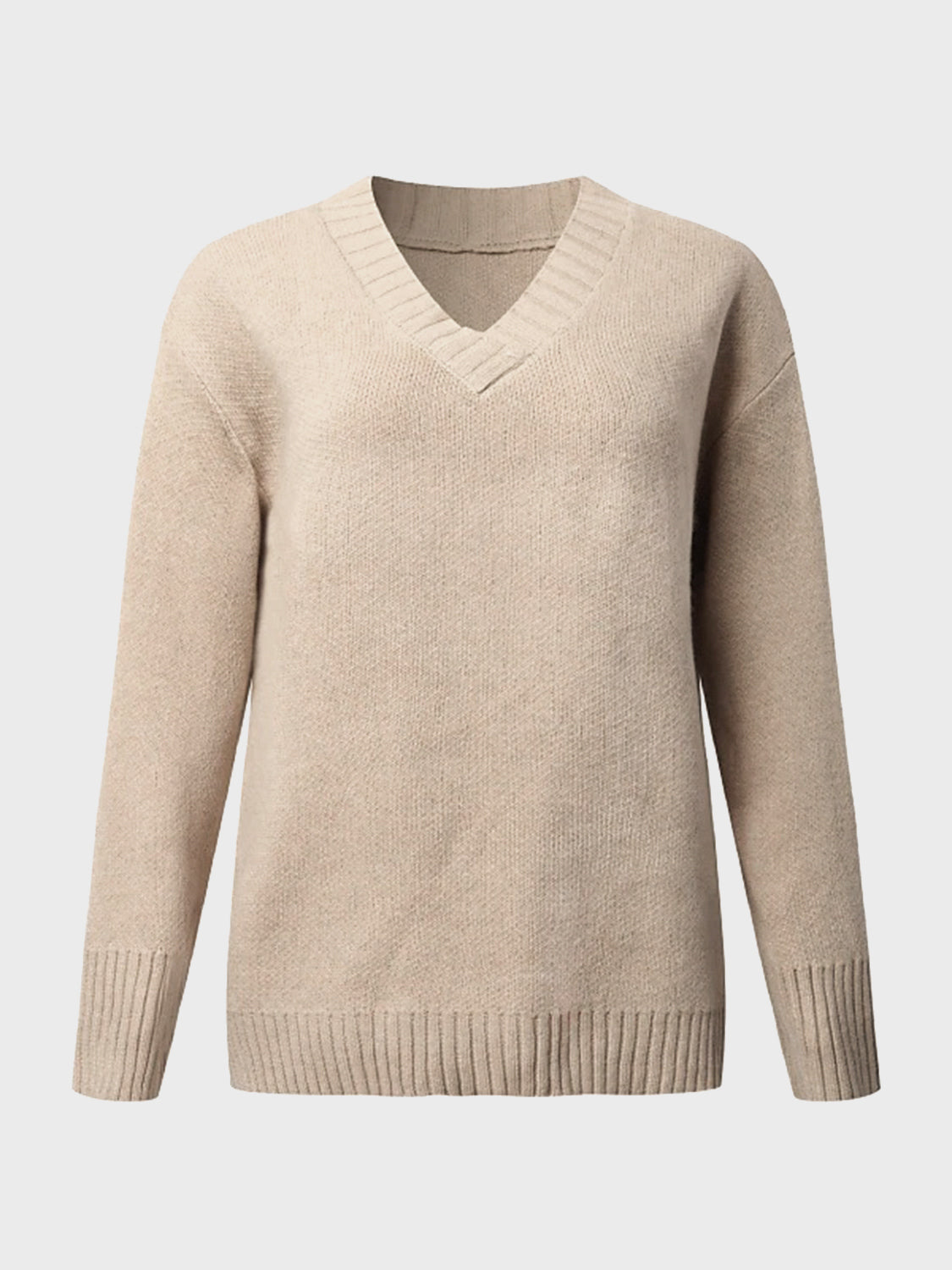 Tan knit sweater with V-neck and ribbed trim details.