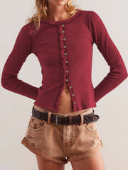 Ribbed button-up second-skin top in Rust with round neck and long sleeves.