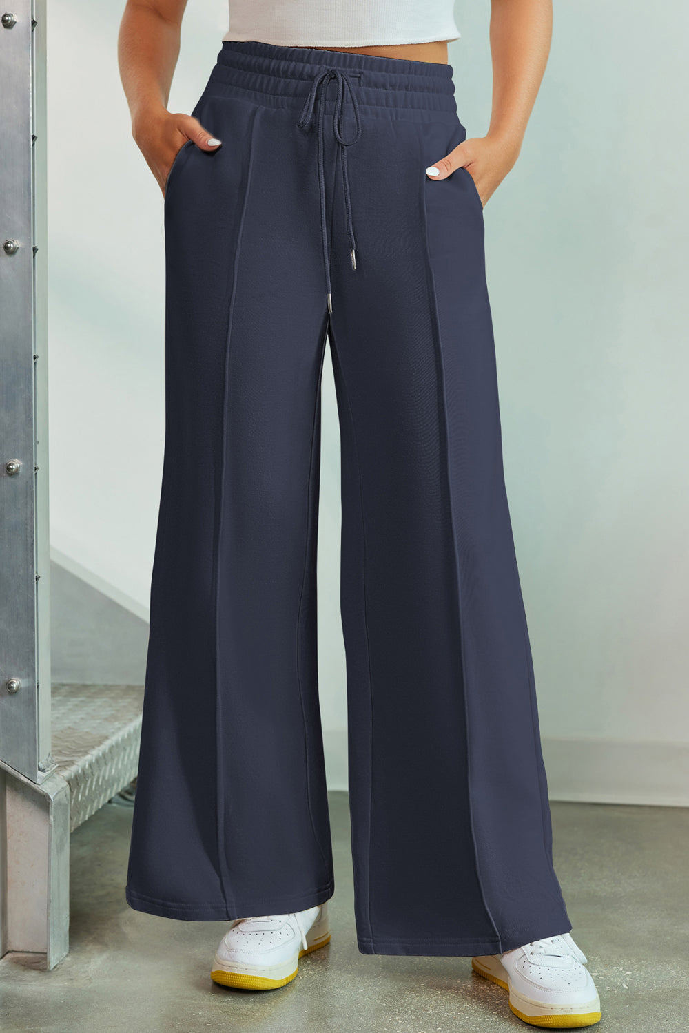 French Blue palazzo joggers with center seam detail and drawstring waist.
