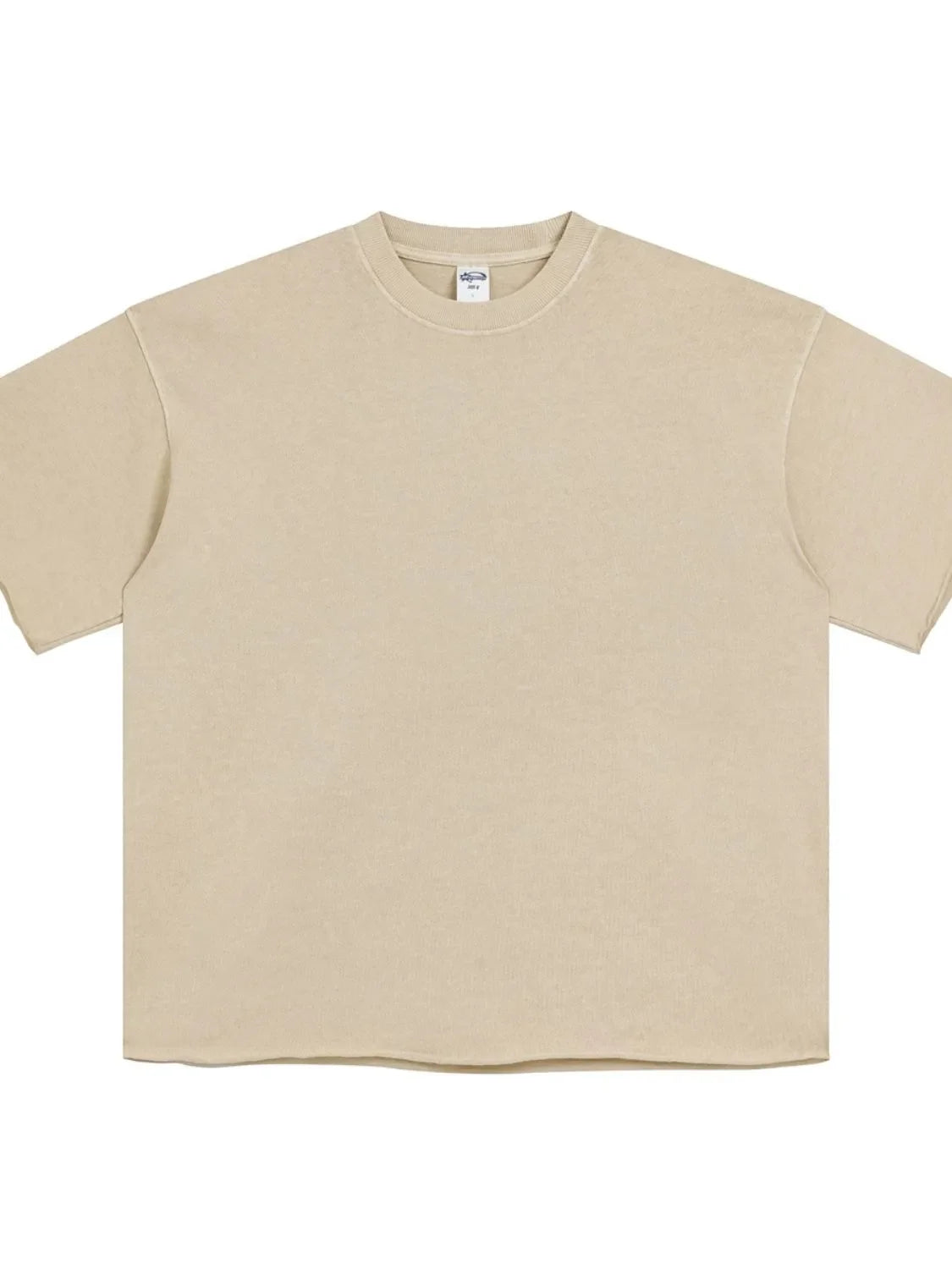 Tan boxy tee with raw hem and relaxed fit.