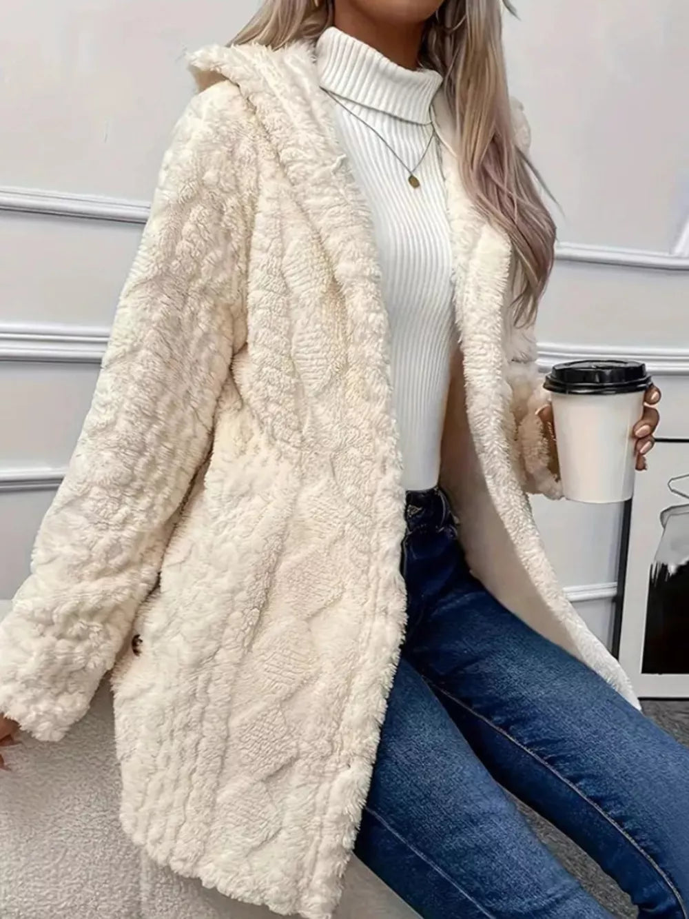 Cream textured hooded trench coat with button detail.