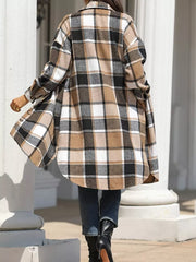 Plaid longline trench coat in khaki with button details and pockets.