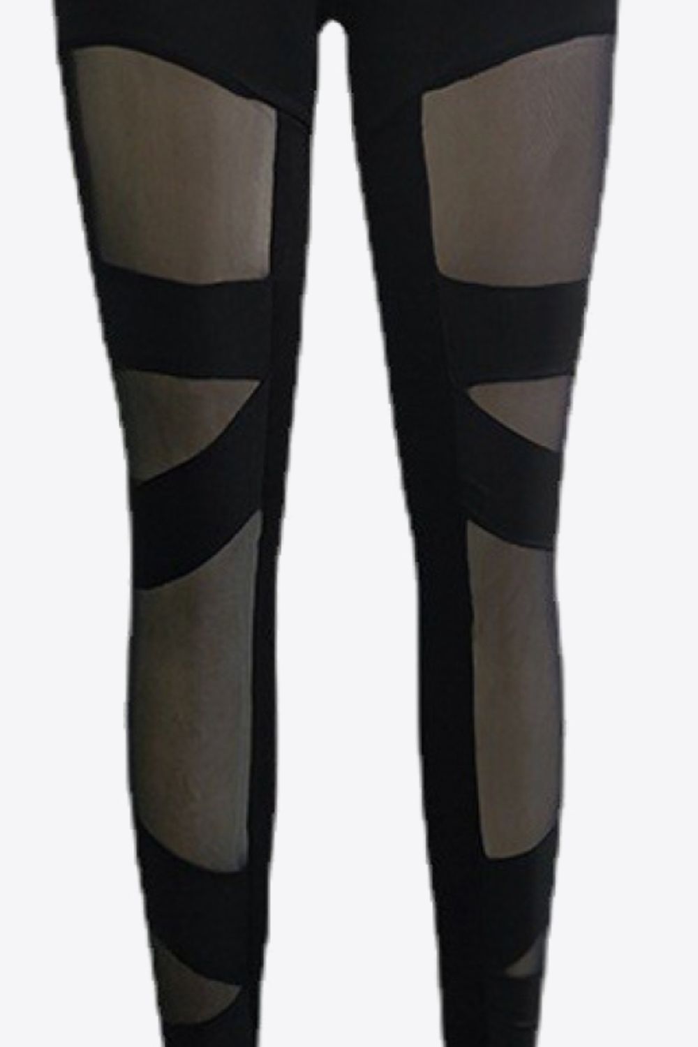 Black leggings with geometric mesh panels on the legs.