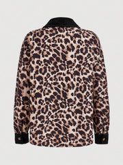 Leopard corduroy utility shirt jacket with black corduroy collar and cuffs.