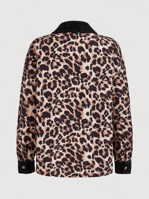 Leopard corduroy utility shirt jacket with black corduroy collar and cuffs.