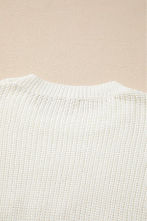Ivory knit sweater with crew neck and ribbed texture