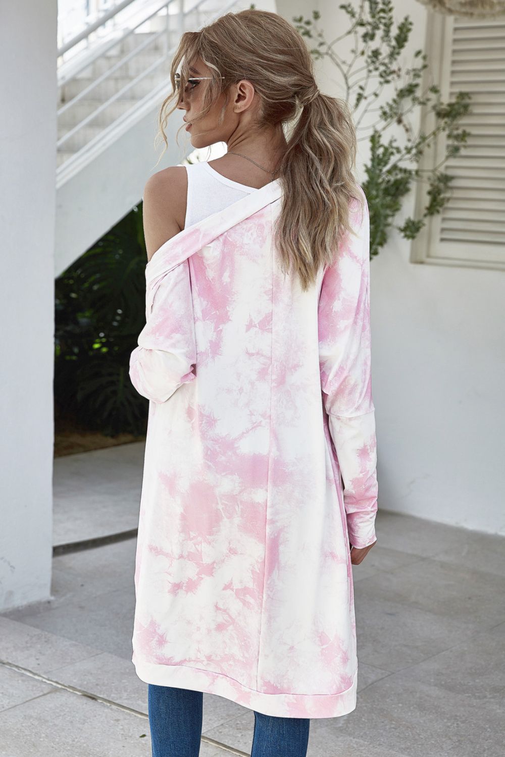 Blush pink and white tie-dye duster cardigan with long sleeves and an open front.