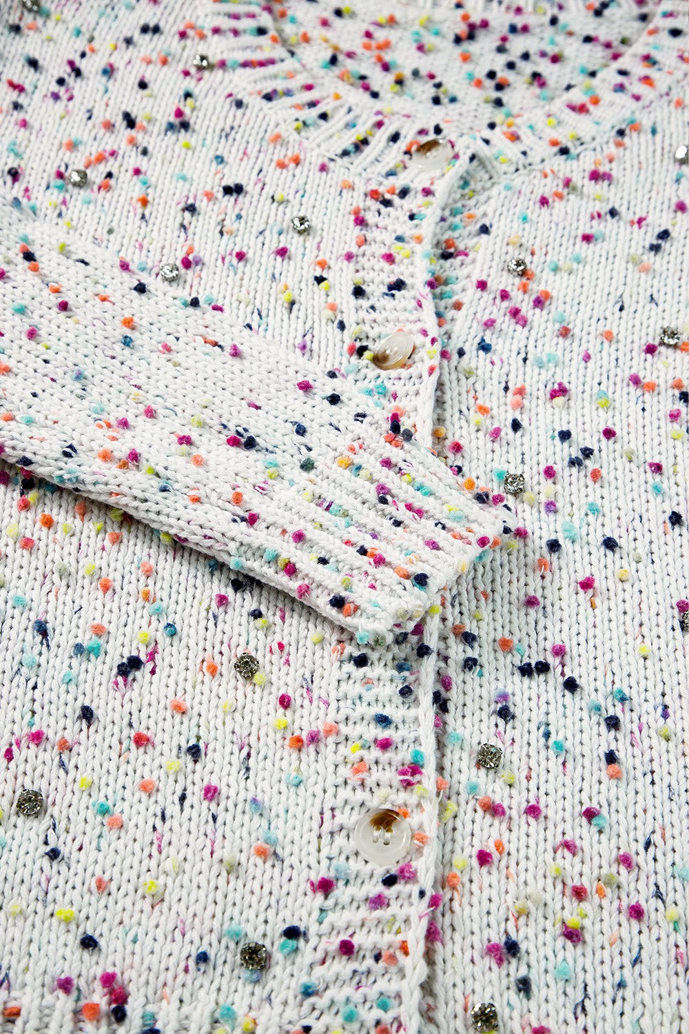 Confetti knit button-up cardigan in white with colorful speckles and scattered rhinestones.