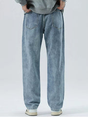 Light blue 100% cotton men's loose-fit jeans with drawstring waist and back pockets.