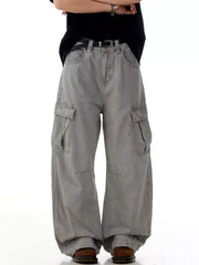Men's grey wide-leg cargo pants with multiple pockets and a relaxed fit.