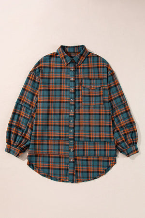 Oversized plaid overshirt in French Blue with layered hem and button front.