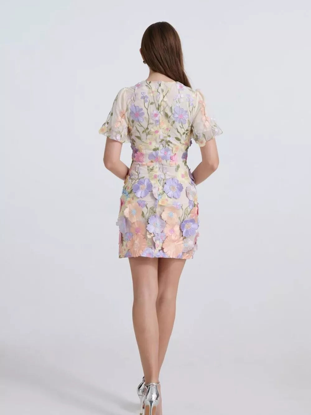 Embroidered floral mini dress in yellow with puff sleeves and 3D applique flowers.