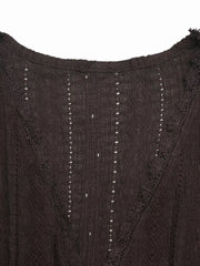 Brown lace-trimmed ruffled V-neck maternity shirt with eyelet detail.