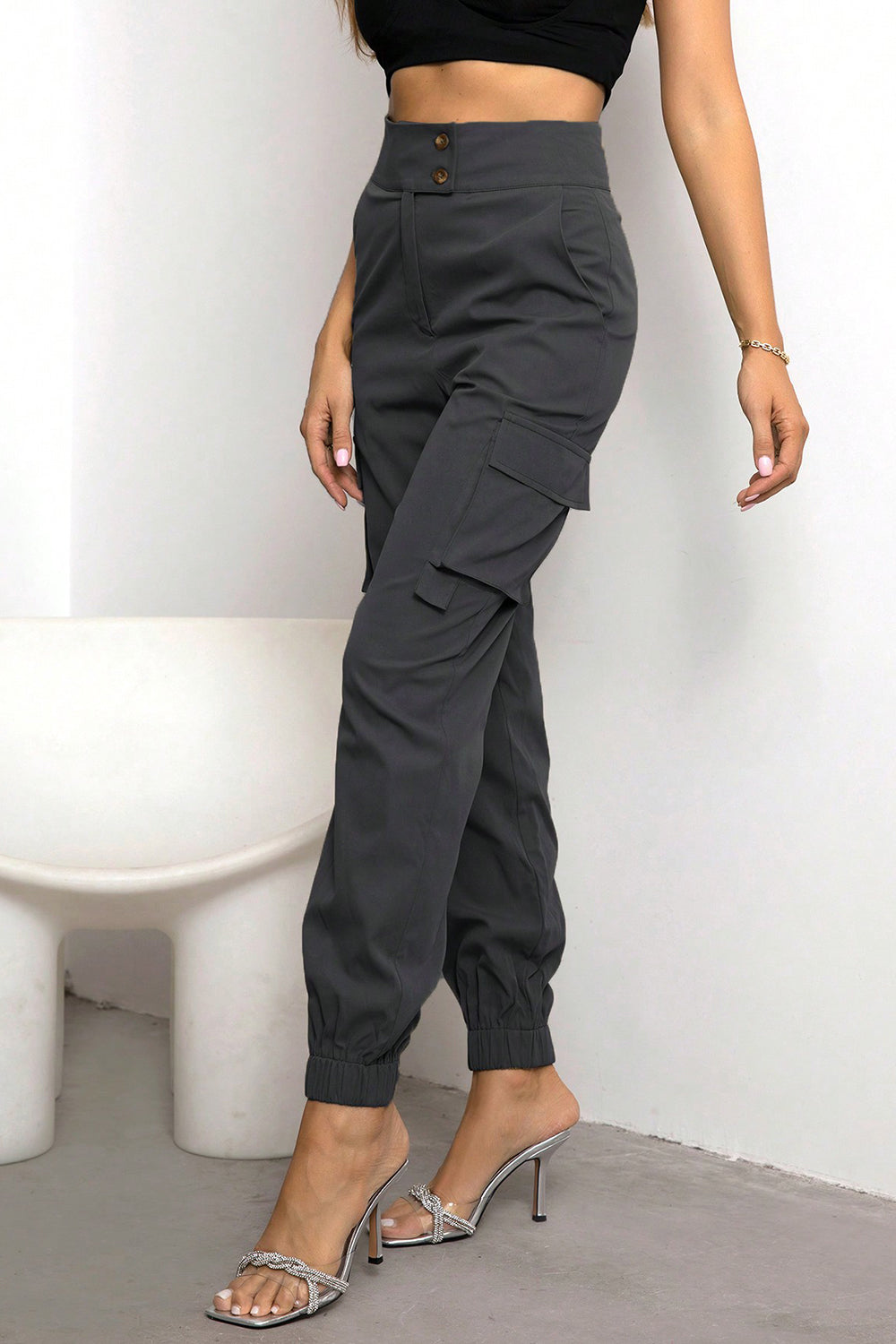 Charcoal utility jogger trousers with cargo pockets and elasticated cuffs.