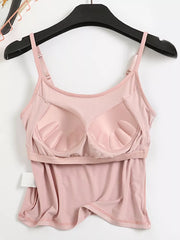 Pink cami with built-in padded cups and adjustable straps.
