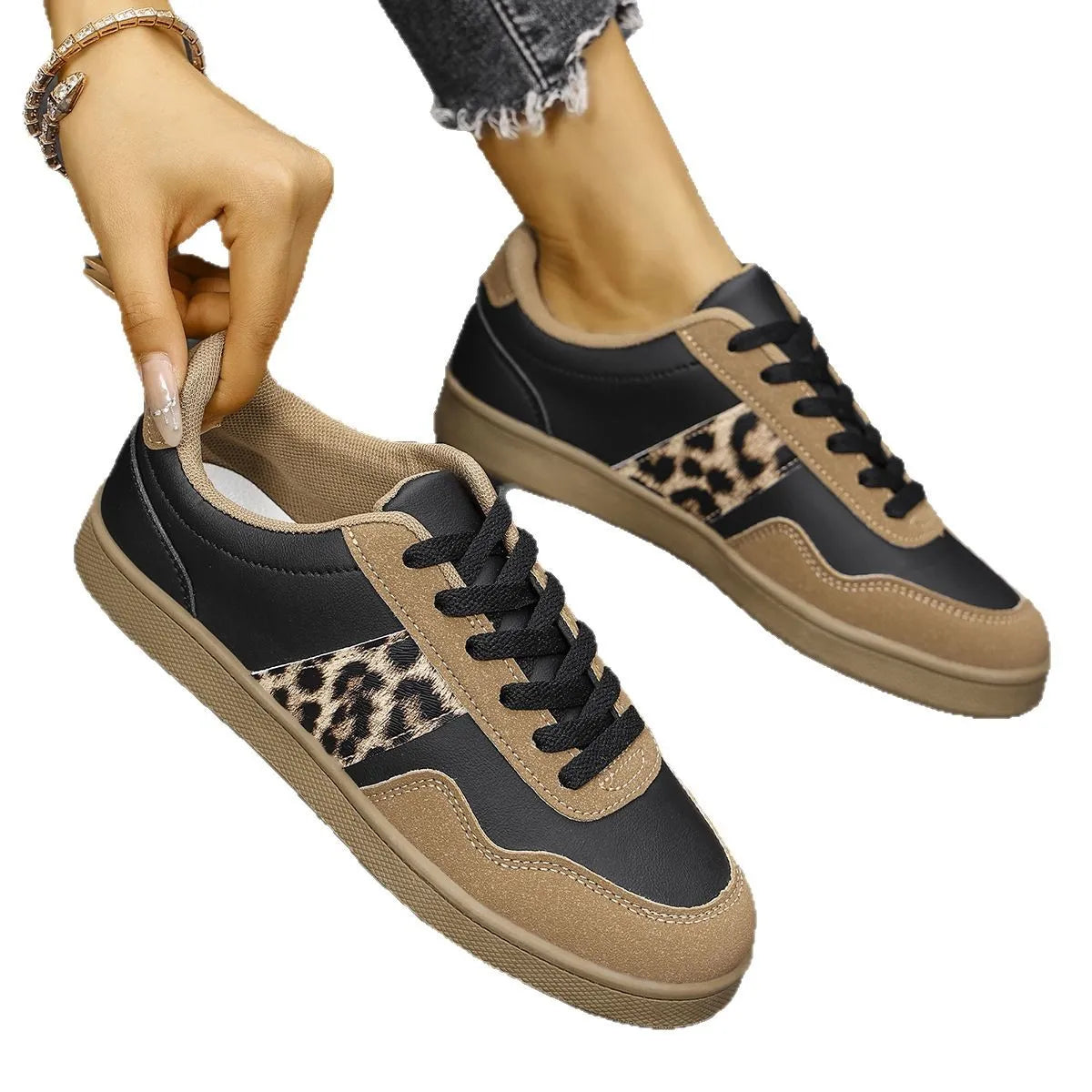 Leopard panel retro sneakers in black and taupe with lace-up closure.